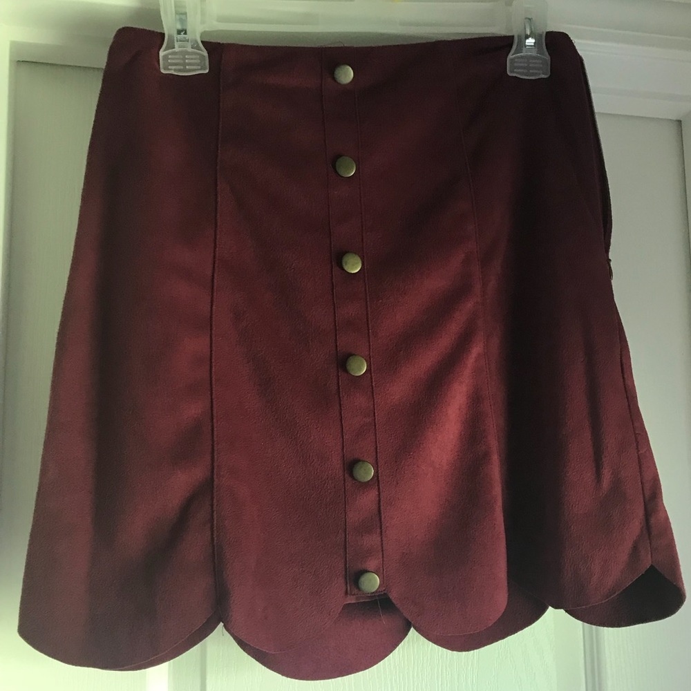 Scalloped skirt with faux buttons
